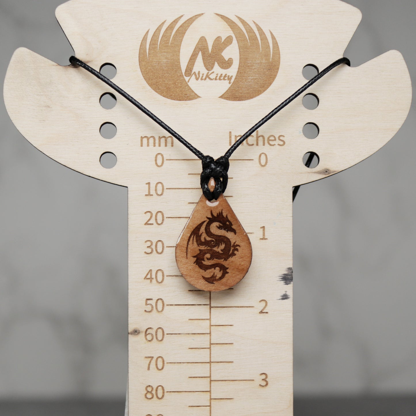 Small Dragon Wood Teardrop Style Necklace with Adjustable Cord