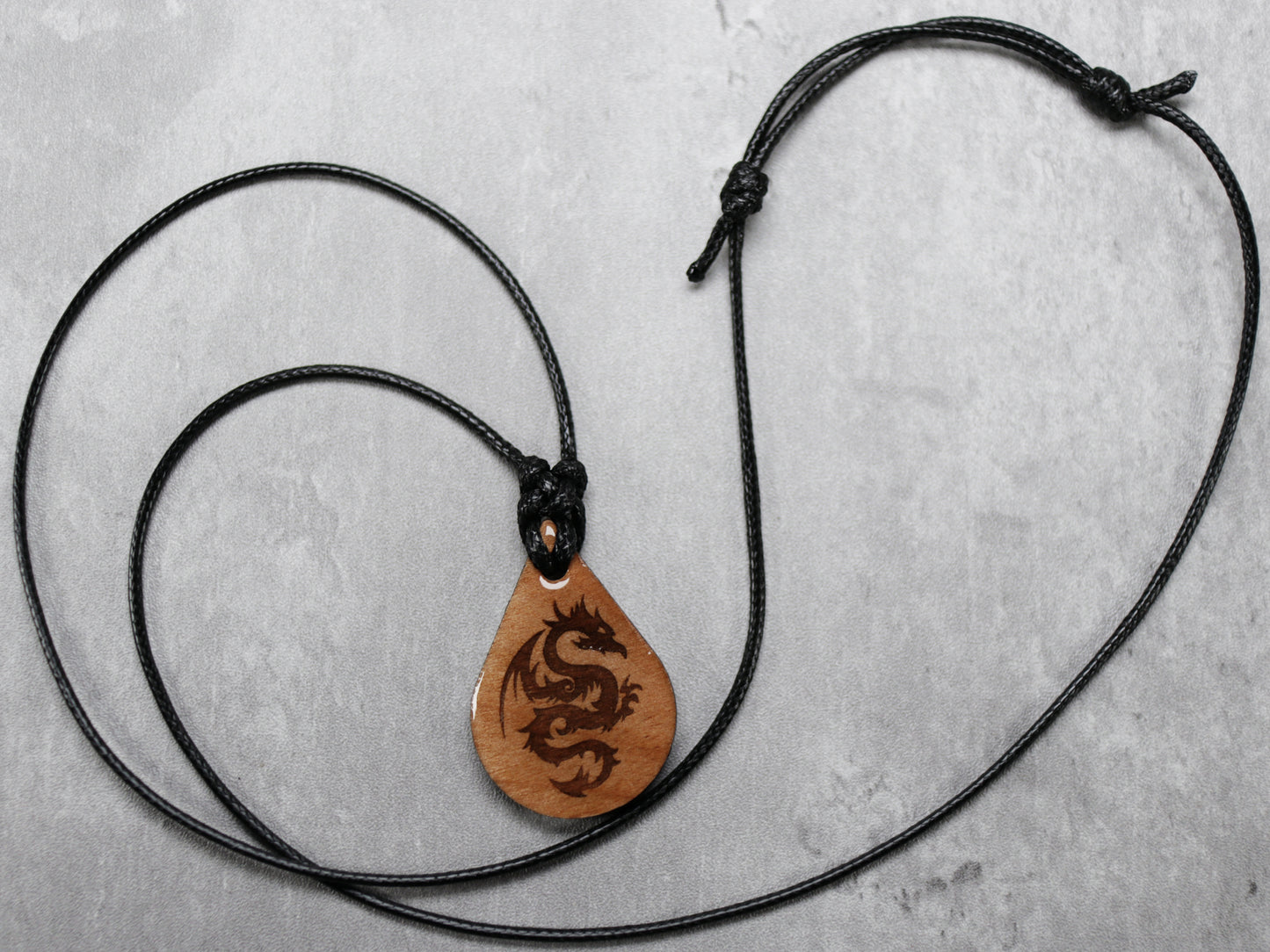 Small Dragon Wood Teardrop Style Necklace with Adjustable Cord